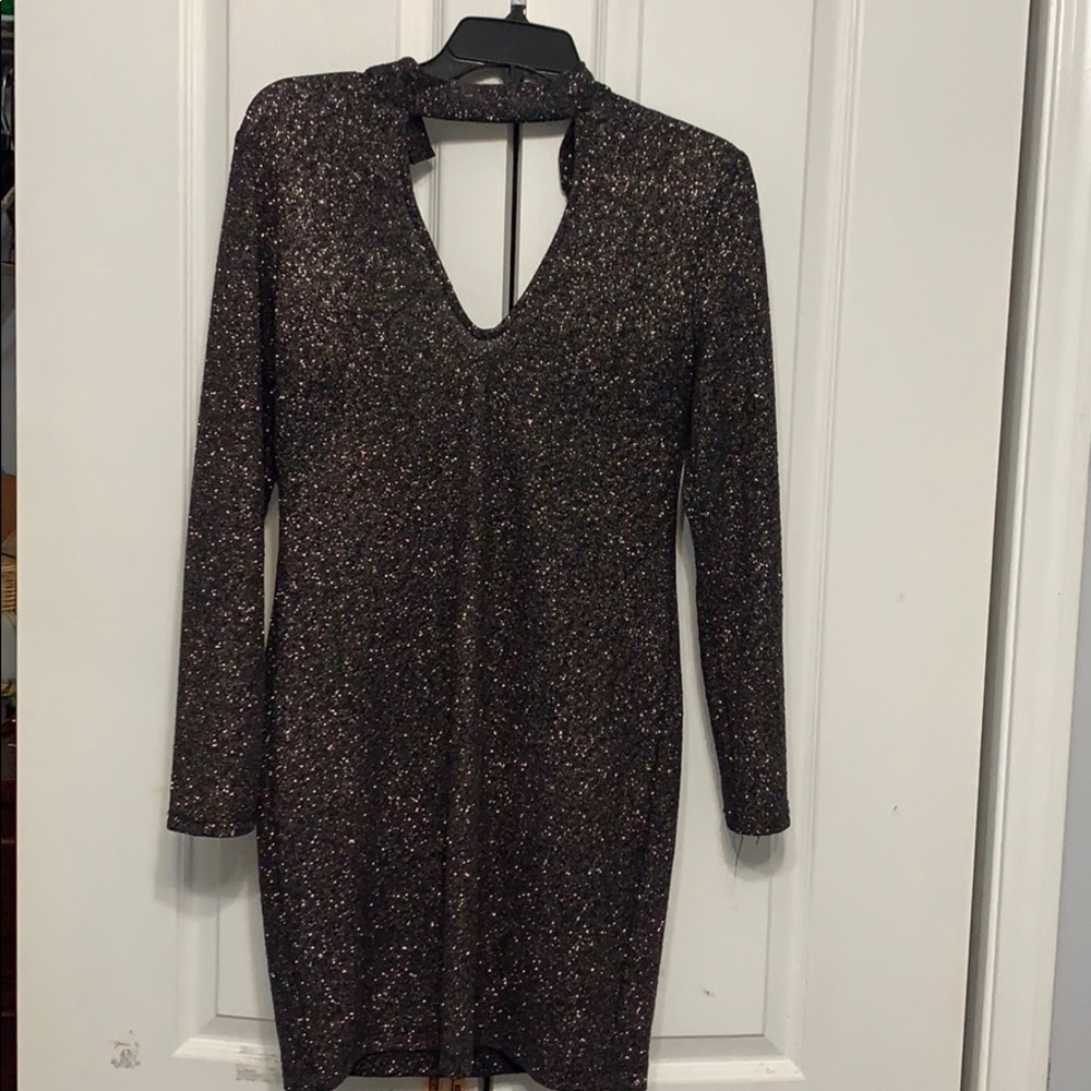 Black form fitting glittery dress